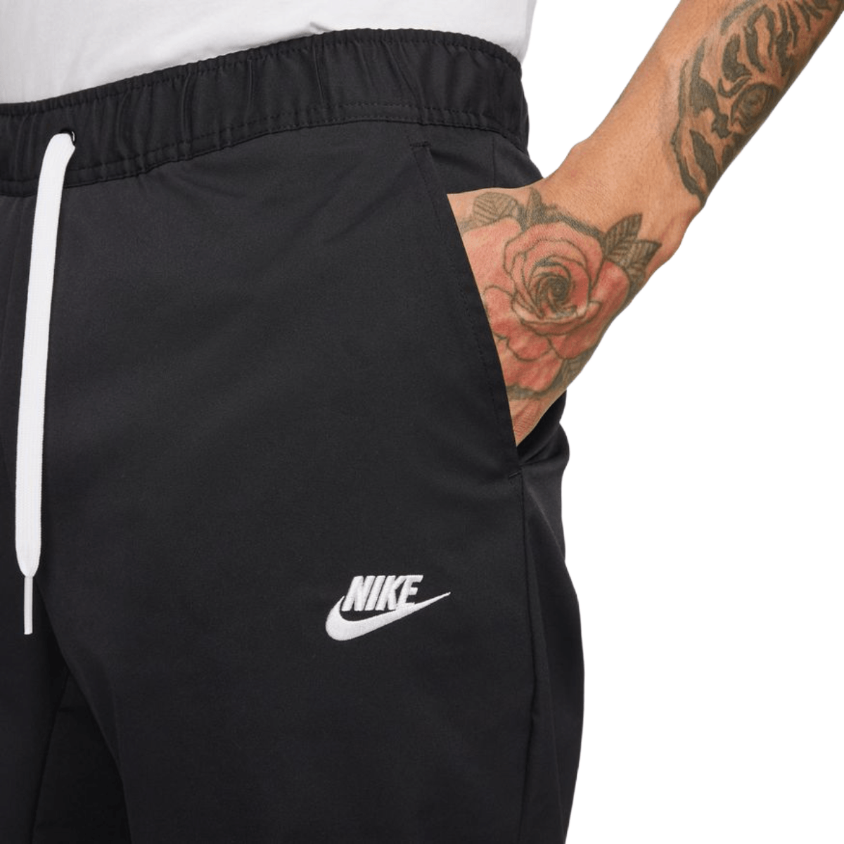 Nike Club Men's Woven Tapered-Leg Trousers. Nike IE